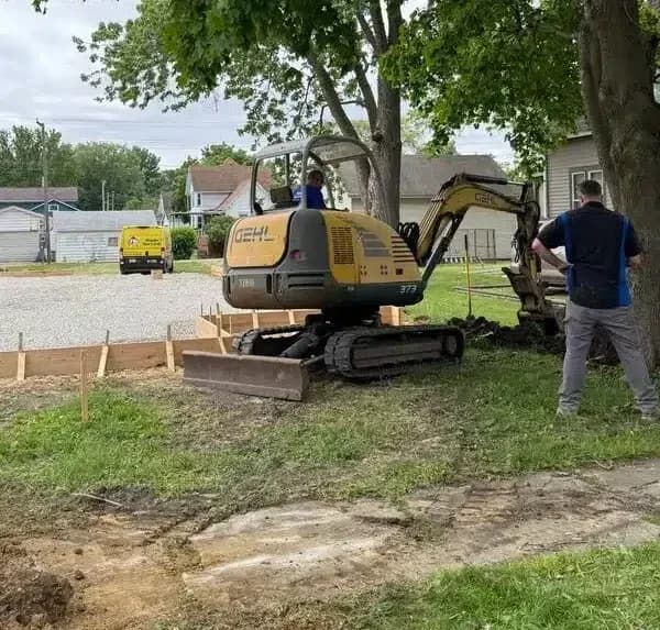 Triple service working on habitat for humanity