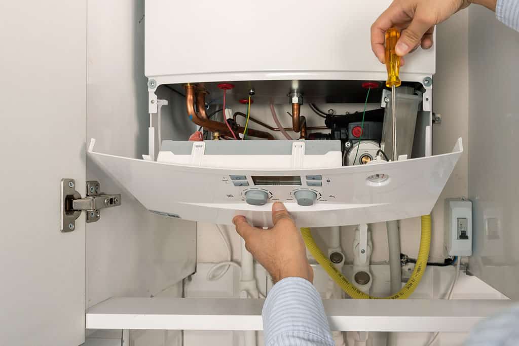 Installing new tankless hot water heater in Mendota, IL.