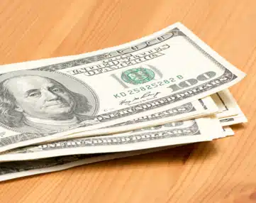 Stack of one hundred dollar bills